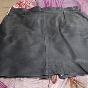 Woman leather skirt